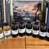 Zuccardi Valle de Uco featured photo of two chardonnays and six Malbecs.