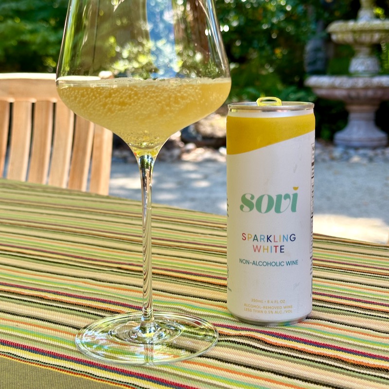 Photo of Sovi Sparkling White wine in can and in a glass